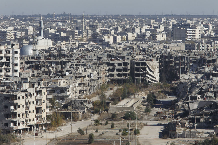 A general view shows Al Qosour neighbourhood of Homs, Syria, on Tuesday. Humanitarian aid has reached a besieged  rebel-held area in the central Syrian city of Homs, part of a local ceasefire deal that is to include the withdrawal of opposition fighters, the Syrian Observatory for Human Rights said (Reuters photo by Omar Sanadiki)