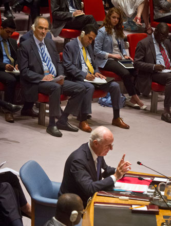 Syria’s United Nations Ambassador Bashar Jaafari (top left) listens as UN Special Envoy for Syria Staffan de Mistura (bottom) speaks during a Security Council meeting on Syria  at the UN headquarters on Wednesday (AP photo)