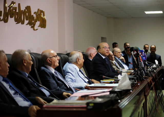 Judge Medhat Al Mahmoud, presiding over the supreme federal court, reads a verdict on appeals concerning amendment of an election law in Baghdad, Iraq, on Thursday (REUTERS photo)