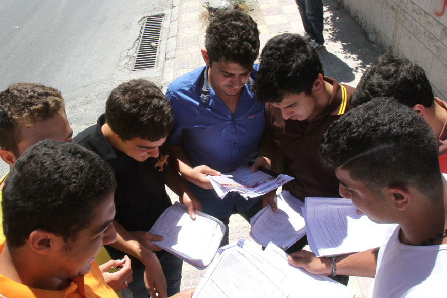 In this undated file photo, Tawjihi students gather outside the exam hall in Amman (Photo by Nader Daoud)