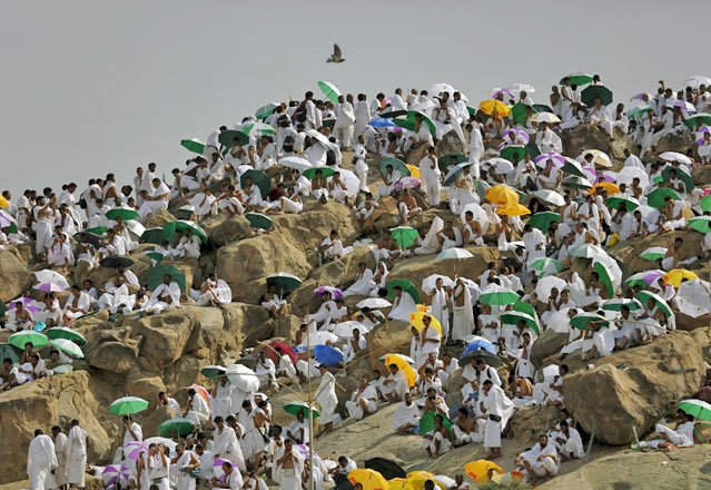 Pilgrims pray on Mount of Mercy on the plains of Arafat during the annual Hajj, outside the holy city of Mecca, on Wednesday (Reuters photo by Ahmad Masood)