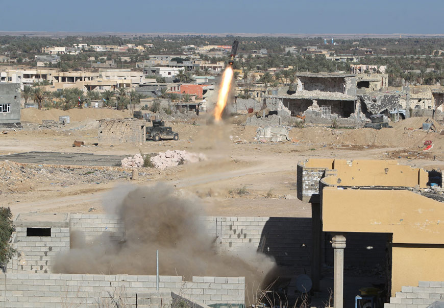 A picture taken on Monday shows a rocket propelled grenade fired by Iraqi security forces in the rural town of Husayba in the Euphrates Valley, seven kilometres east of Ramadi, where government forces have been closing on the Daesh militants who seized the Anbar province’s capital in May after a three-day blitz involving dozens of huge truck bombs (AFP photo)