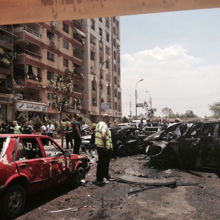 Emergency personnel inspect damages after a bomb attack has targeted Egypt’s prosecutor general in the Heliopolis district of Cairo on Monday (AP photo by Ahmed Hatem)