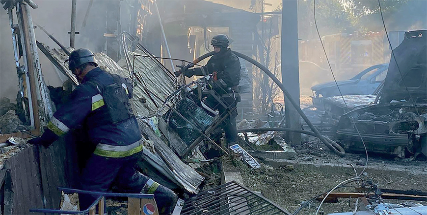 This undated handout photo published on the official Telegram channel of the Ministry of Internal Affairs of Ukraine on Saturday, shows firefighters working at the site of a Russian strike in the centre of Vilniansk, Zaporizhzhia region (AFP photo)