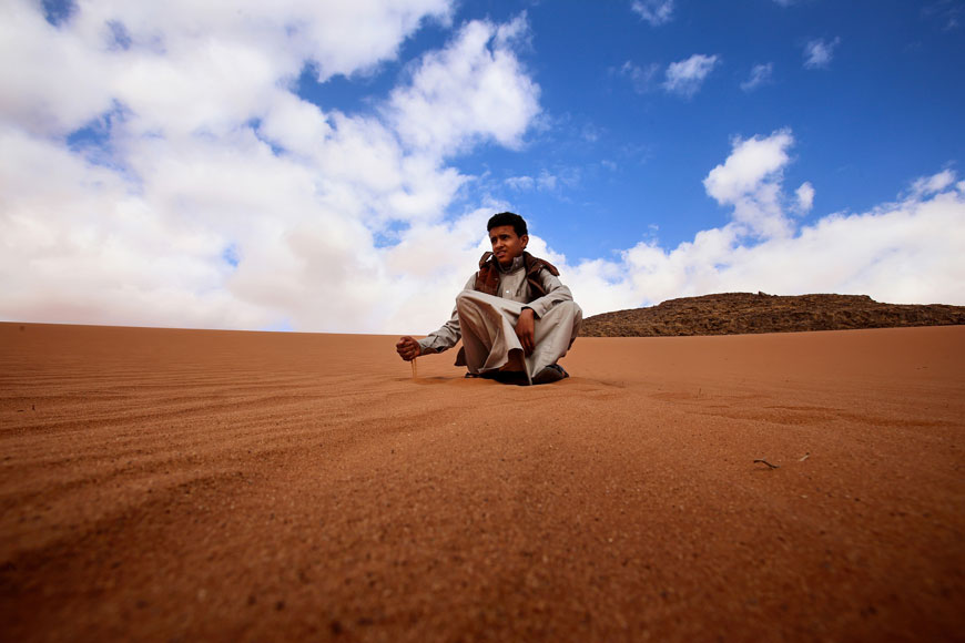 In this photo taken January 9, Jacir Eid, who plays the title character in 'Theeb', poses for a photo in Wadi Rum, in southern Jordan (AP photo by Raad Adayleh)