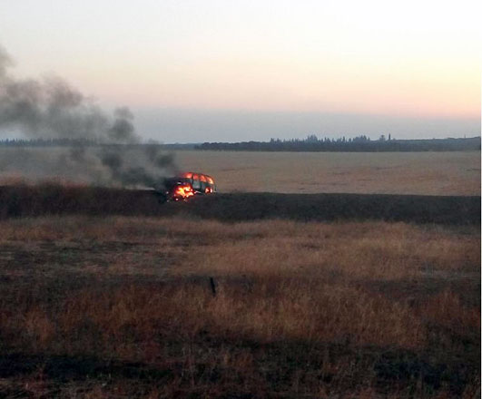 A vehicle belonging to infiltrators is seen on fire  after border guards hit it on the Syrian border on  Friday (Petra photo)