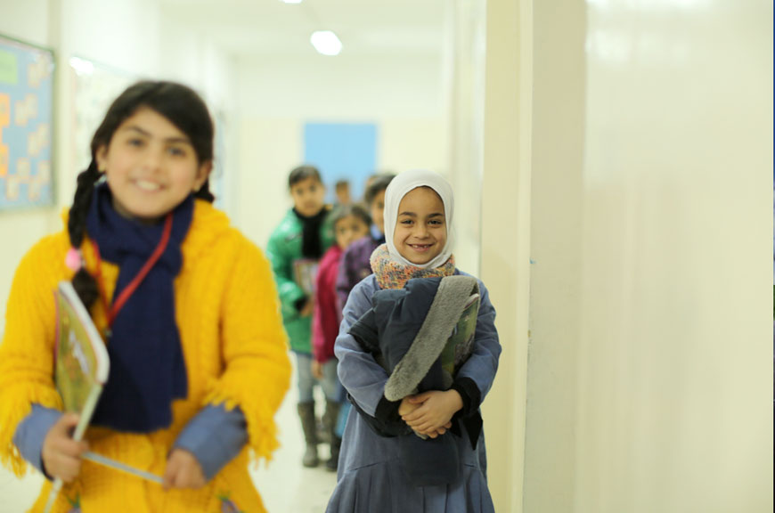 Students are seen at UNRWA’s Amir Hasan Girls School in south Amman in this February 2014  file photo (Photo courtesy of UNRWA/Alaa Ghosheh)