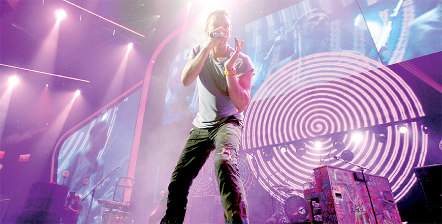 Musician Chris Martin of the band Coldplay performs onstage at the iHeartRadio Music Festival held at the MGM Grand Garden Arena on September 23, 2011 in Las Vegas,Nevada (AFP photo)