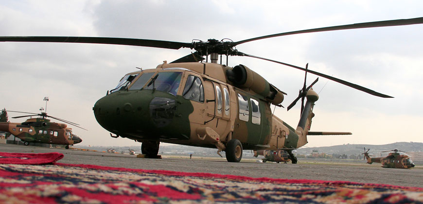 Blackhawks are seen in a military airport in Amman, delivered by the US as part of military assistance to Jordan, on Thursday (Photo by Osama Aqarbeh)