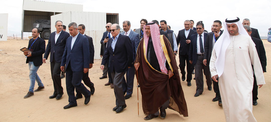 Prime Minister Hani Mulki and Director of the Abu Dhabi Fund for Development Adel Hosani visit the Qweirah solar energy station on Thursday (Petra photo)