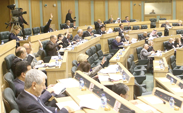 Parliamentarians take part in a session in Amman on Thursday  (Petra photo)