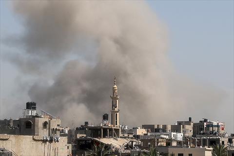 Smoke billows from an Israeli strike at Bureij camp in the central Gaza Strip, on March 27, 2025 (AFP photo)