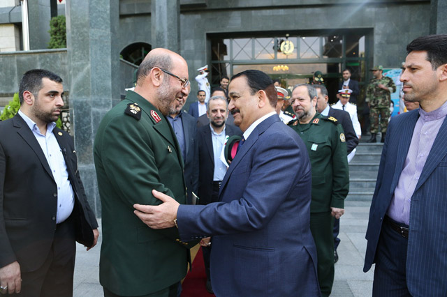 This Iranian ministry of defence handout photo shows Iranian Defence Minister Hossein Dehghan (2nd left) welcoming Iraqi Defence Minister Irfan Al Hayali (2nd right) prior to their meeting at the defence ministry building in Tehran, Iran, on Saturday (Anadolu Agency photo)