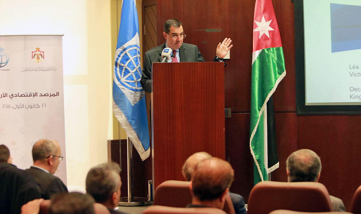 Planning and International Cooperation Minister Imad Fakhoury addresses a gathering where a World Bank-compiled report was launched in Amman on Sunday (Petra photo)