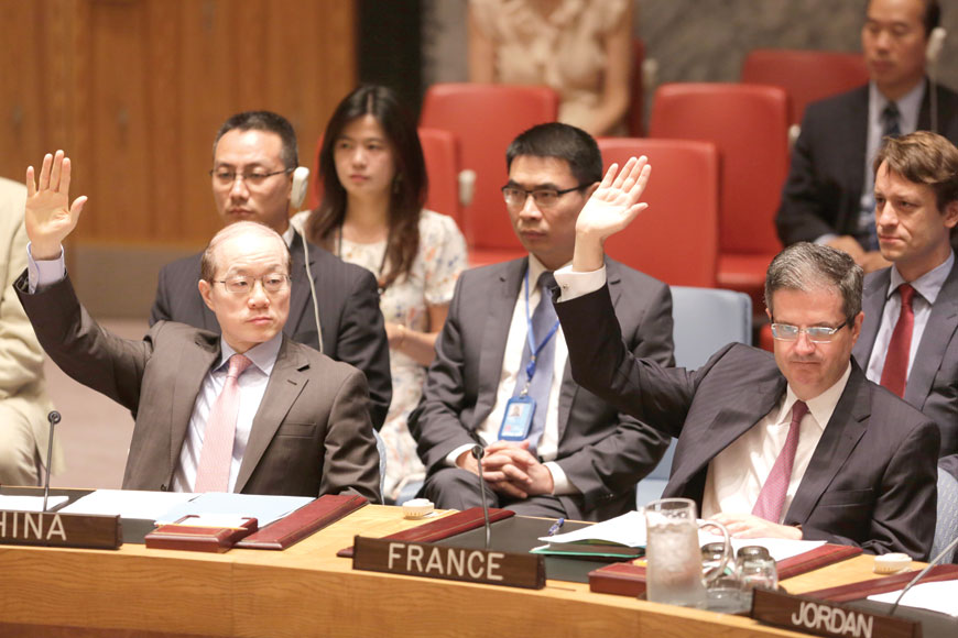 Diplomats vote in favour of a Security Council resolution approving Iran's nuclear deal at United Nations headquarters on Monday (AP photo by Mark Lennihan)