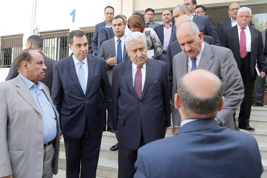 Prime Minister Abdullah Ensour speaks to ministers and officials outside the headquarters of the Department of Statistics after he chaired the higher ministerial committee of the 2015 census (Photo courtesy of Planning Ministry)