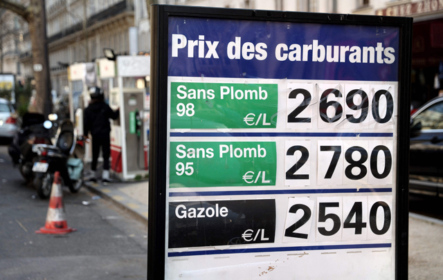 This photo taken in Paris on Wednesday shows a board displaying the fuel prices at a gas station, as refueling has become significantly more expensive as a result of the war in Ukraine (AFP photo)