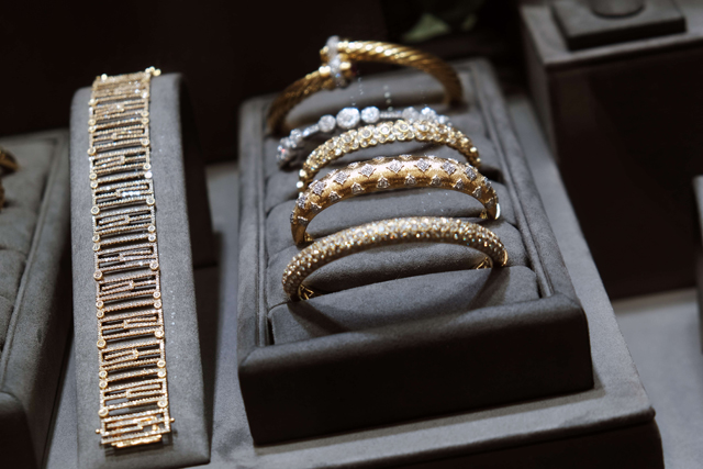 This photo shows gold jewelry displayed in a window of a store in Manhattan's jewelry district on Monday in New York City as gold prices have surpassed $2,000 an ounce (AFP photo)