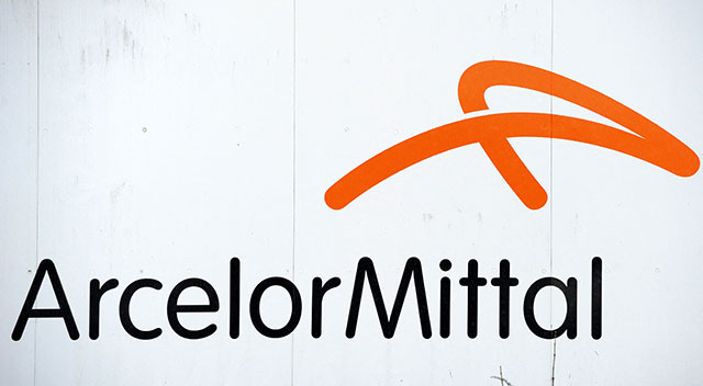  This file photo taken on November 27, 2012 shows the logo of ArcelorMittal at a factory in Dunkirk, northern France. (AFP photo)