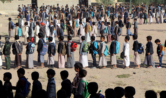 Students perform the morning drills at their school which lost pupils in an August 2018, Saudi-led air strike on a school bus in Saada province, Yemen, on October 6 (Reuters photo)