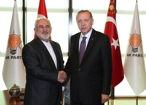 Turkey's President Recep Tayyip Erdogan (right) and Iranian Foreign Minister Javad Zarif shaking hands prior to holding talks in Ankara, on Wednesday (AFP photo)