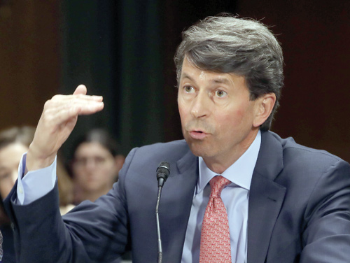 In this file photo taken on March 6, Mark Begor, CEO of Equifax, testifies during a Senate Homeland Security and Governmental Affairs Subcommittee hearing on Capitol Hill, March 7, in Washington, DC. US credit monitoring agency Equifax agreed to pay up to $700 million in a settlement stemming from a data breach that affected nearly 150 million customers, regulators said on Monday (AFP photo)