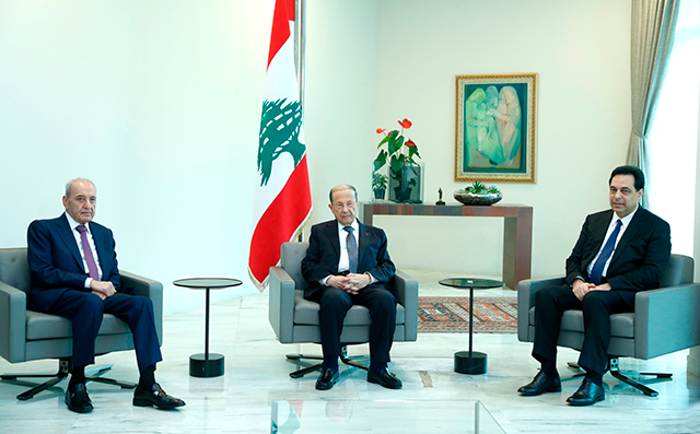 Left to right: Lebanon's Parliament Speaker Nabih Berri, President Michel Aoun, and Prime Minister Hassan Diab meeting together at the presidential palace in Baabda, east of Beirut, on May 6. (AFP photo)