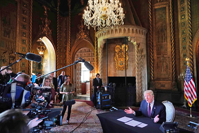 US President Donald Trump speaks to the press after talking to members of the military via teleconference from his Mar-a-Lago resort in Palm Beach, Florida, on Thanksgiving Day, on Thursday (AFP photo)