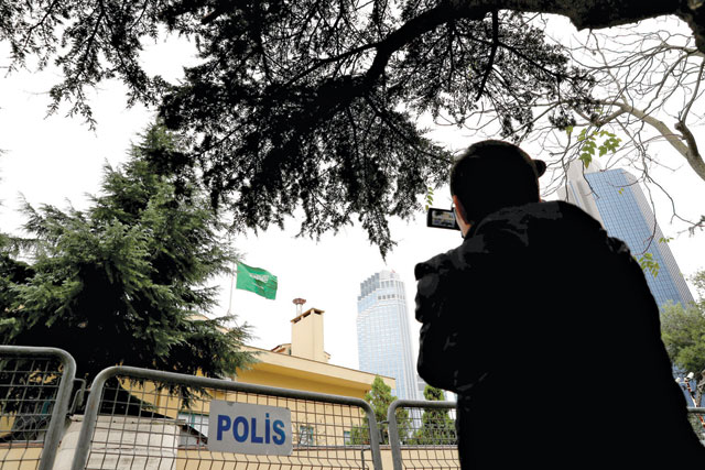 A camera operator films outside the Saudi Arabia's consulate in Istanbul, Turkey, on Saturday (Reuters photo)