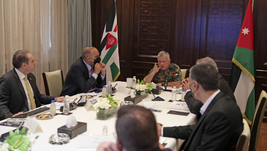 His Majesty King Abdullah chairs a meeting to follow up on the government’s measures to develop the health sector at Basman Palace on Sunday (Photo courtesy of Royal Court)