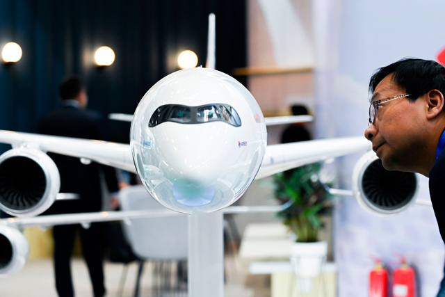 An Airbus A350-1000 plane model is dispalyed at the Beijing International Aviation Expo in Beijing on Wednesday (AFP photo)