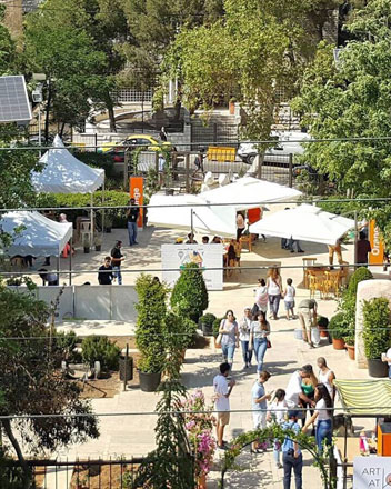   In this photo taken on July 7, 2017, people can be seen walking around the Jordan National Gallery of Fine Arts’ park in Jabal Luweibdeh, Amman, during an Art at the Park event (Photo courtesy of Art at the Park)