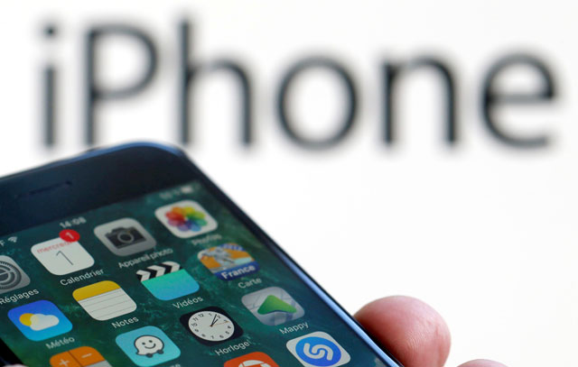 An Apple iPhone 7 and the company logo are seen in this illustration photo taken in Bordeaux, France, on Wednesday (Reuters photo)