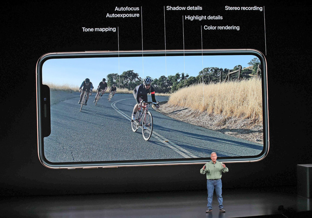 Phil Schiller, senior vice president of worldwide marketing at Apple Inc., speaks at an Apple event at the Steve Jobs Theatre at Apple Park in Cupertino, California, on Wednesday (AFP photo)