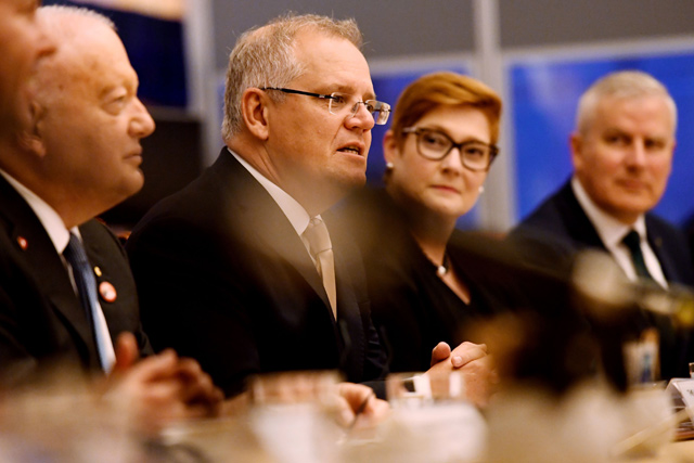 Australian Prime Minister Scott Morrison (centre) speaks during a meeting with Indonesian President Joko Widodo (not pictured) in the Cabinet room at Parliament House in Canberra, on Monday  (AFP photo)
