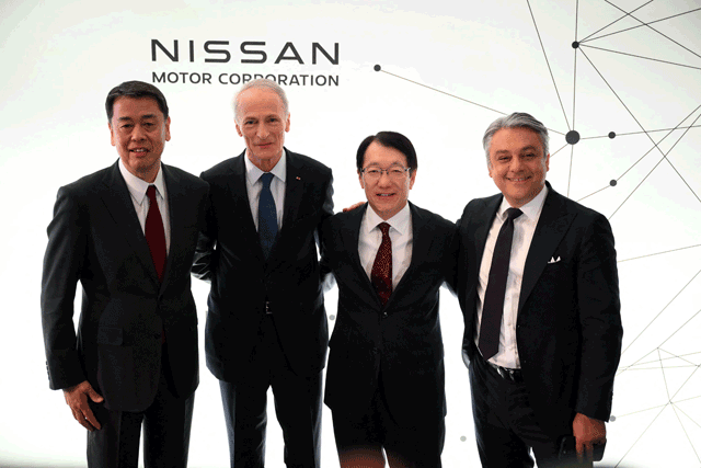 Nissan chief executive officer Makoto Uchida, Renault Chairperson Jean-Dominique Senard, Mitsubishi Motors Chief Executive Officer Takao Kato and Renault Chief Executive Officer Luca de Meo pose at the end of a press conference in London, on Monday (AFP photo)
