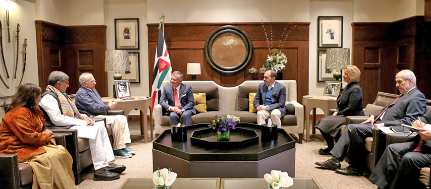 His Majesty King Abdullah meets with a delegation representing the Steering Committee of the Laureates and Leaders for Children Summit 2018 at Al Husseiniya Palace on Sunday (Photo courtesy of Royal Court)