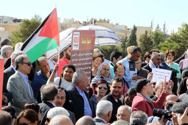 The National Jordanian Committee for the 100th Anniversary of the Balfour Declaration on Thursday staged a protest in front of the British embassy (Photo by Osama Aqarbeh)