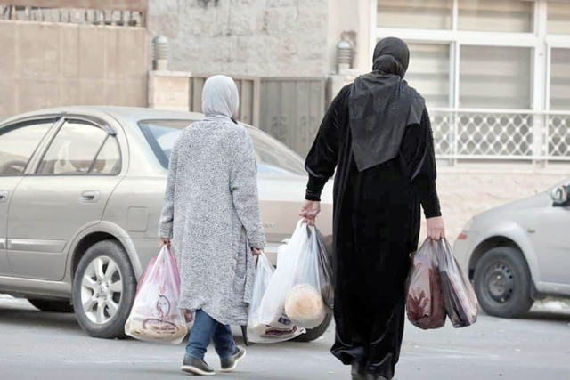 Many citizens have stocked upon essential items ahead of expected severe weather conditions on Tuesday (Photo by Osama Aqarbeh)