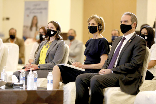 Health Minister Feras Al Hawari and USAID’s Mission Director Sherry Carlin attend the launching of national COVID-19 vaccination campaign on Tuesday (Photo courtesy of USAID)