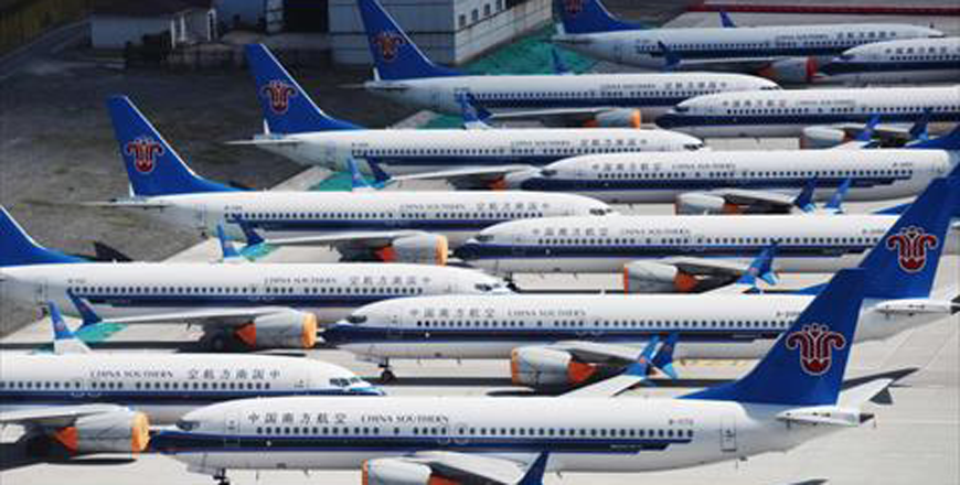 This photo taken on June 5, 2019 shows grounded China Southern Airlines Boeing 737 MAX aircraft parked in a line at Urumqi airport, in China's western Xinjiiang region (AFP photo)