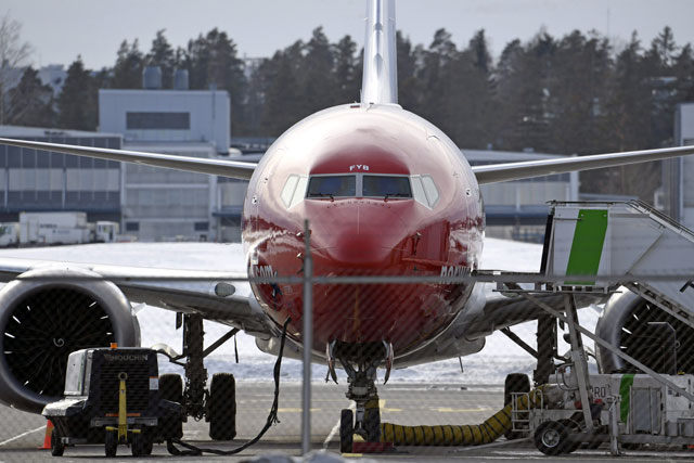 A grounded Boeing 737 MAX 8 passenger plane of the Norwegian low-cost airline Norwegian is parked at the tarmac at Vantaa airport in Vantaa near Helsinki, Finland, on Wednesday (AFP photo) 