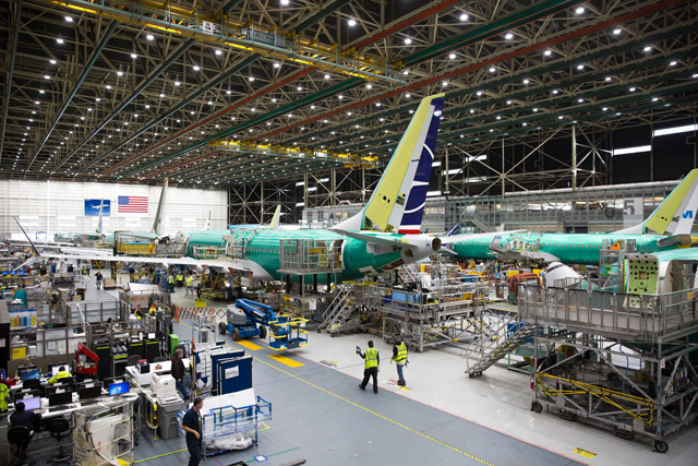 Employees work on Boeing 737 MAX airplanes at the Boeing Renton Factory in Renton, Washington on March 27, 2019 (AFP photo)