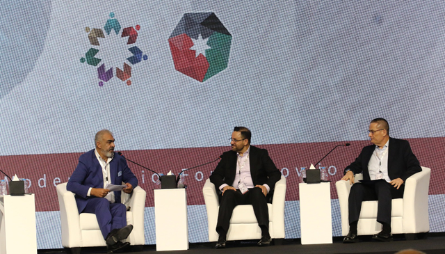Finance Minister Mohamad Al-Ississ and Governor of the Central Bank of Jordan  Adel Sharkas attend a session on fiscal and monetary policy at the ‘A Year of Modernisation’ forum at the Dead Sea on Friday (Petra photo)