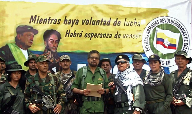 This TV grab taken from YouTube and released on Thursday shows former senior commander Ivan Marquez(centre) and fugitive rebel colleague, Jesus Santrich (wearing sunglass), of the dissolved FARC rebel army group in Colombia, on an undisclosed location of Colombia announcing that they are taking up arms again along with other guerrillas who have distanced themselves from a peace accord signed with the government in 2016 (AFPphoto)