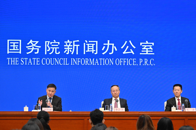 Pan Gongsheng, governor of the People's Bank of China, Li Yunze, minister of the National Financial Regulatory Administration and Wu Qing, chairman of the China Securities Regulatory Commission, hold a press conference at the China's State Council Information office in Beijing on Tuesday (AFP photo)