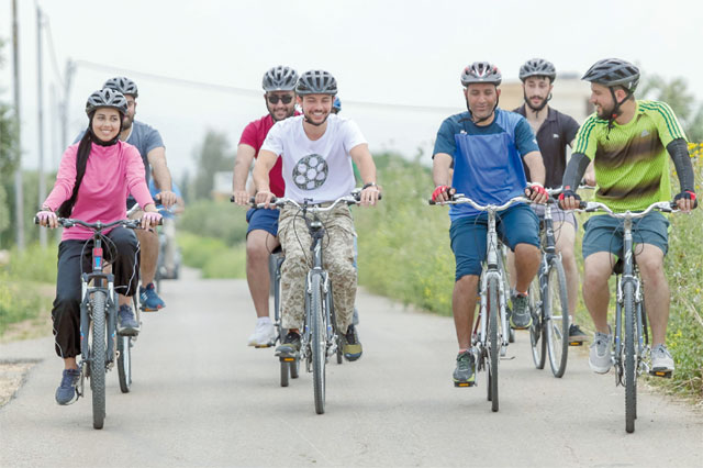   HRH Crown Prince Hussein takes a bike tour during a visit to Umm Qais on Tuesday afternoon (Photo courtesy of Royal Court)