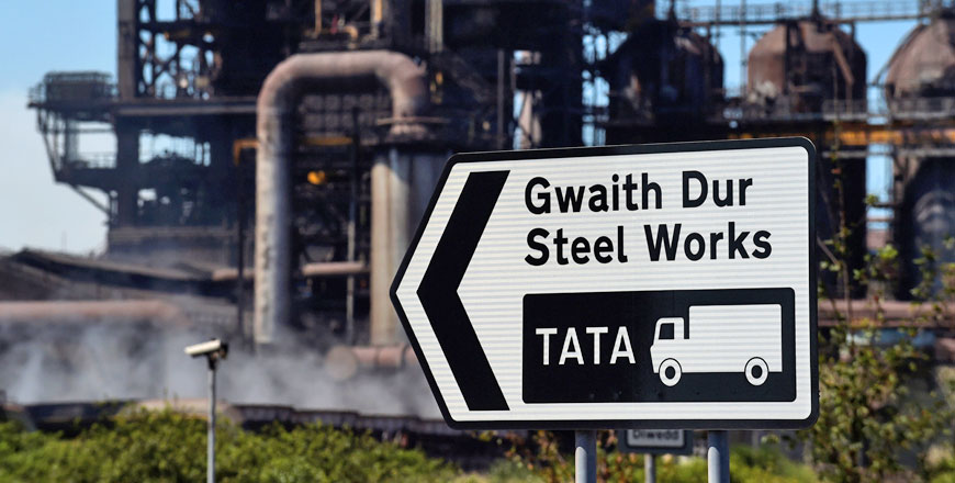 A road sign points to the Tata steelworks in Port Talbot, Wales, on Saturday (Reuters photo)