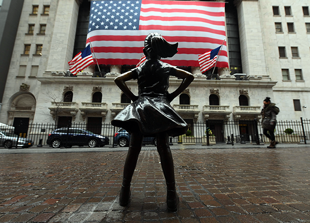 The Fearless Girl statue stands in front of the New York Stock Exchange near Wall Street on March 23, 2020 in New York City. (AFP photo)