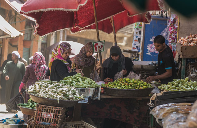 Egyptian women are seen as they buy vegetables in an open-air marketplace in Cairo, Egypt (Anadolu Agency file photo)